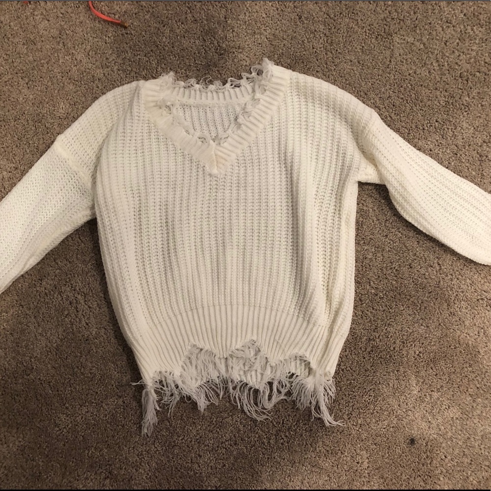 Adorable ripped sweater